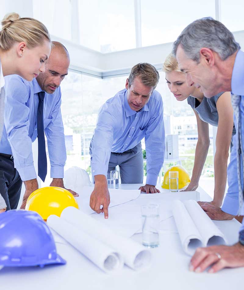 team-business-people-looking-construction-plan